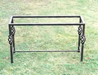 Wrought iron table base with baskets